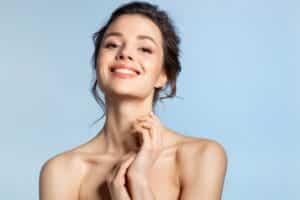 Woman smiling with smooth skin from Forever Young BBL laser treatment in Calgary