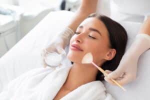 Relaxed woman getting a chemical peel in Calgary, AB