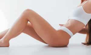 Woman's slim body after CoolSculpting in Calgary, AB